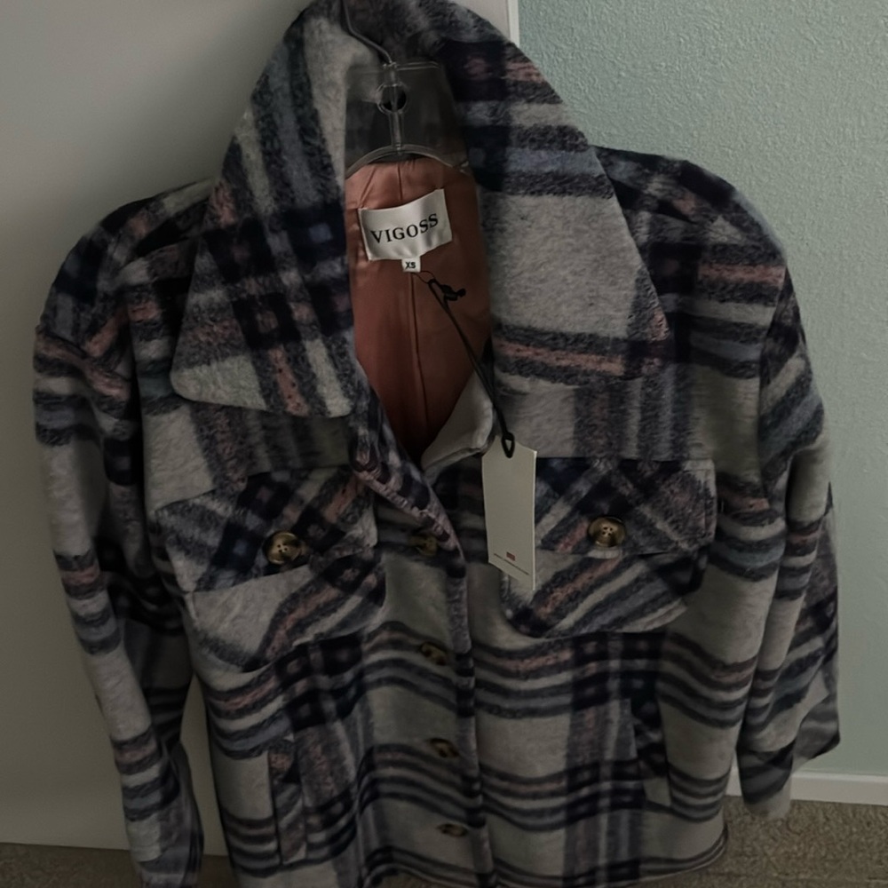 Ladies padded plaid jacket. Unused with tag